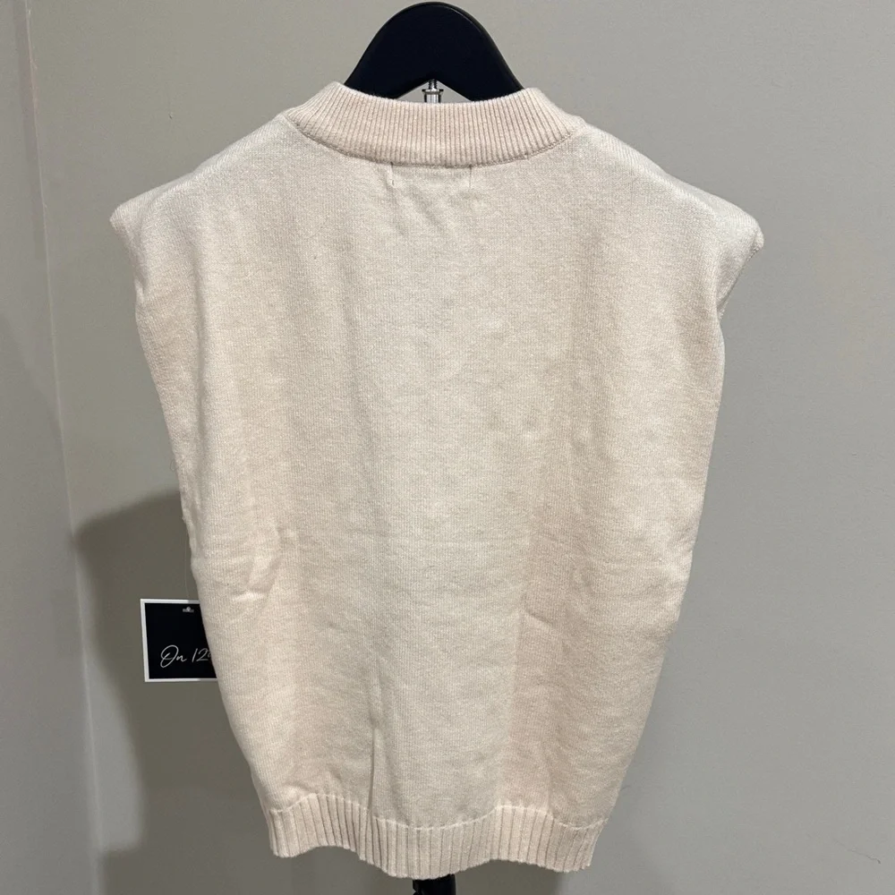 Elegant Cream Sweater with Pearl Accents